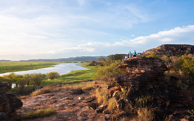 Group of people sitting on lookout, Kakadu National Park, Jabiru, Northern Territory © Tourism Australia