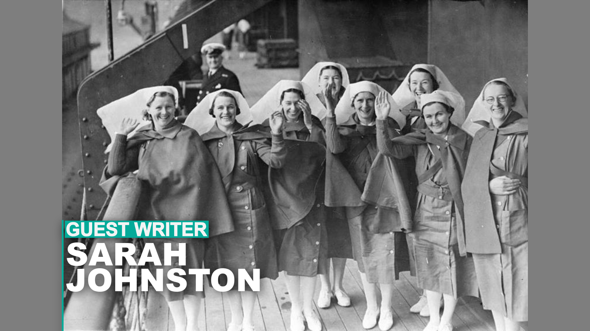 A group of nurses in uniform waving to the camera
