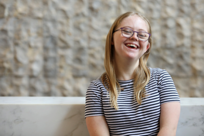 A young woman smiling