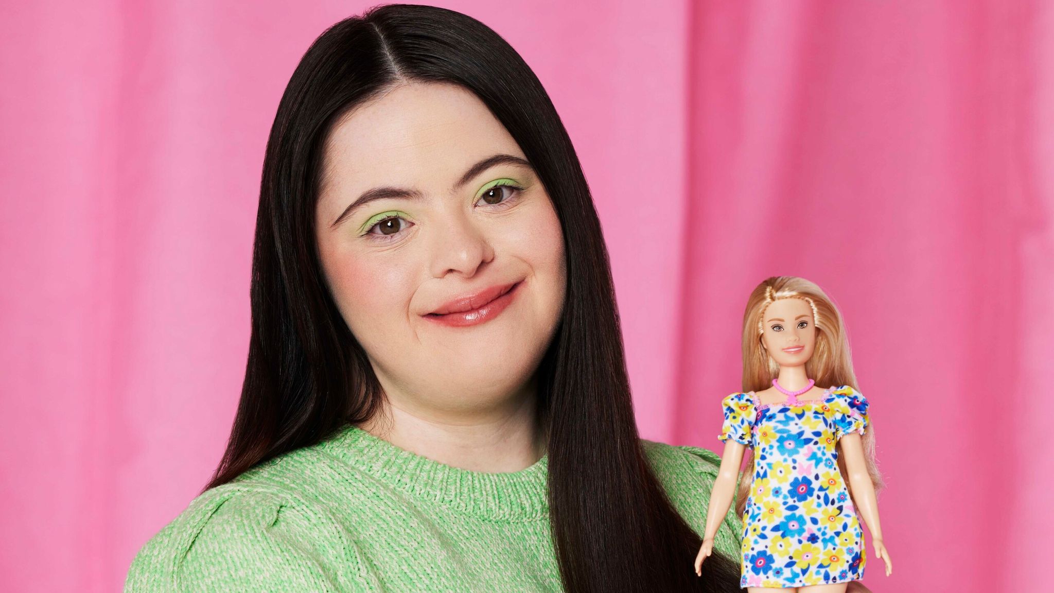 British model Ellie Goldstein with Barbie's first doll representing someone with Down syndrome