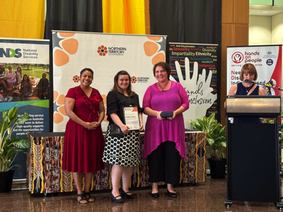 Health Ambassador Alishia Lindsay receives an award