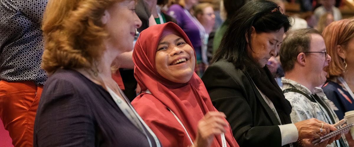 This is a photo of several females in the audience at a confernence