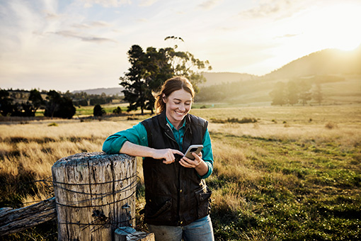 Female farmer using mobile