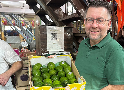 Antony Allen, CEO, The Avolution with a box of their avocados