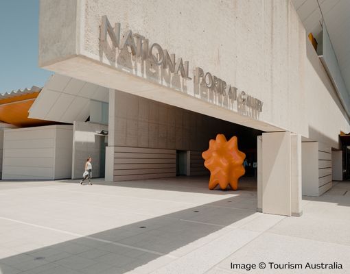 The entrance to the National Portrait Gallery with a spiky plastic orange sculpture. Image: Tourism Australia