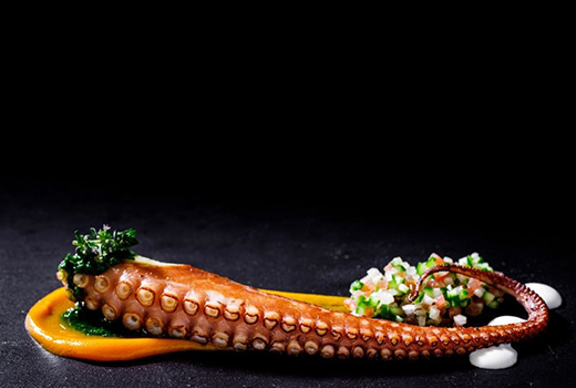 Cooked wild-caught octopus with a salsa