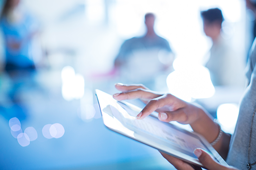 Female using a digital tablet