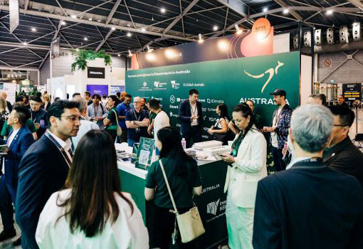 Crowds of people at the Australia booth at tradeshow