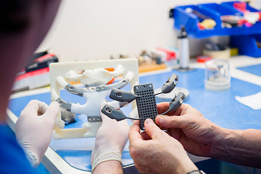 Researcher checking customised medical implant