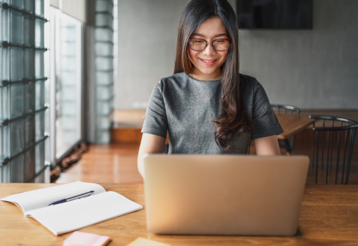 Woman working at a laptop