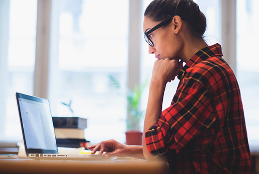A woman using a laptop