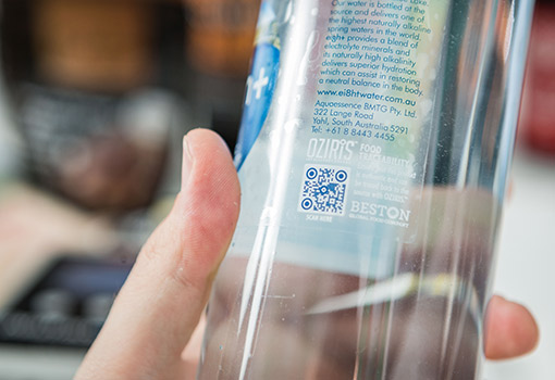 Checking labelling on bottle