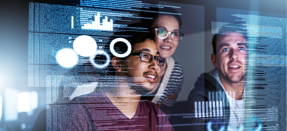 Young programmers looking through data